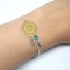 bracelet doré vert émeraude argenté rosace feuilles perles en verre de Bohême estampes création Odacassie