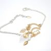 Bracelet chat blanc et doré, étoiles, lune, feuilles, sequin doré et perle en verre de Bohême création Odacassie bijoux et accessoires faits main