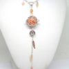 Bola de grossesse orange argenté or rose doré cage fleur feuilles perles plumes petits pieds bijou de grossesse pièce unique réalisée sur commande par Odacassie les créations de Cassandre bijoux et accessoires faits main bijoux poétiques bohèmes romantiques