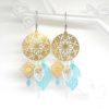 Boucles d'oreilles estampes fleurs losanges étoilés feuilles perles en verre de Bohême doré argenté bleu lagon turquoise vert menthe blanc acier inoxydable chirurgicalboucles d'oreilles attrape-rêves édition limité par Odacassie les créations de Cassandre bijoux et accessoires faits main bijoux poétiques bohèmes romantiques idée cadeau femme adolescente cérémonie mariage