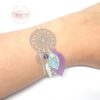 Commande personnalisée bola de grossesse et bracelet coordonnés attrape-rêves dreamcatcher dans les tons argenté violet mauve vert d'eau estampe arbre de vie cage étoilée ailes d'ange, feuilles, étoile, perles en verre de Bohême bijoux pièces uniques par Odacassie les créations de Cassandre bijoux et accessoires faits main bijoux poétiques bijoux bohèmes bijoux romantiques idée cadeau femme enceinte idée cadeau naissance idée cadeau grossesse