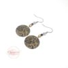 Boucles d'oreilles pailletées lotus doré noir fleurs de lotus collection noël 2020 par Odacassie