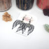 Boucles d'oreilles ailes d'ange noir argenté étoiles acier inoxydable par Odacassie