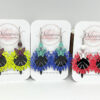 Boucles d'oreilles papillons couronnes de fleurs feuilles perles coloris au choix par Odacassie