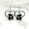 Boucles d'oreilles chats et cœur noir vert menthe rose laiton acier inox par Odacassie